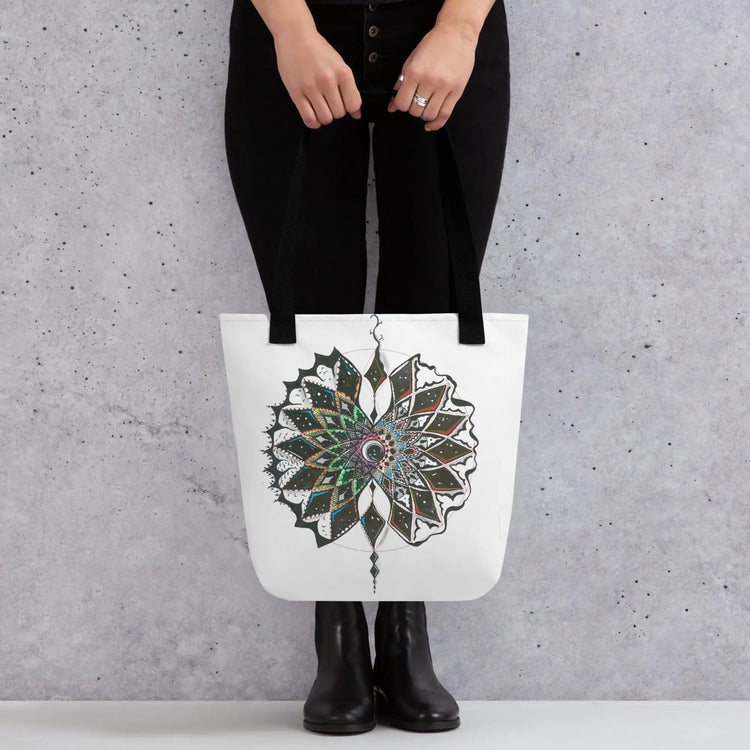 White tote bag featuring colorful mandala artwork and a pencil design for style