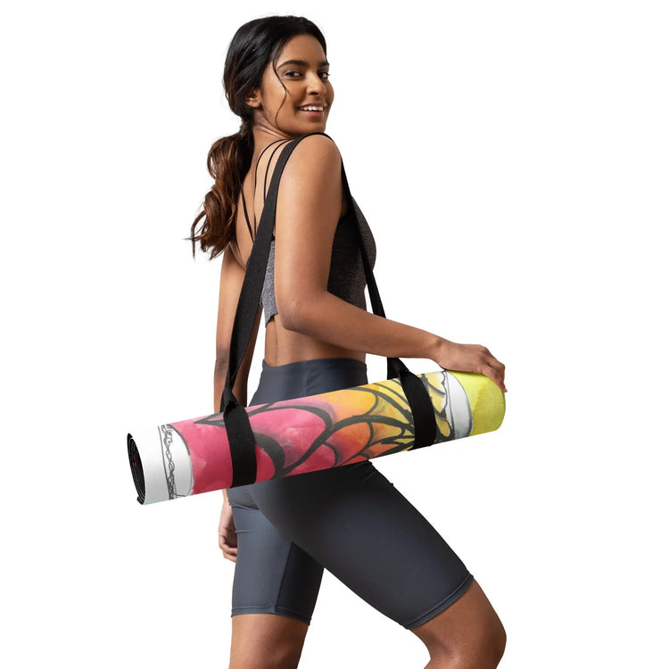 Woman in fitness attire carrying a colorful yoga mat showcasing vibrant artwork in Yoga Mat collection
